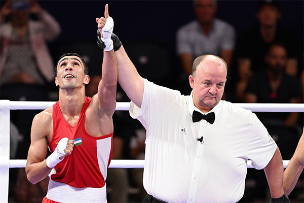 Boxer Abdumalik Khalokov advances to Olympic final