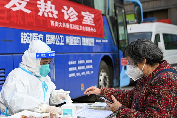 China to manage COVID-19 with measures against Class B infectious diseases