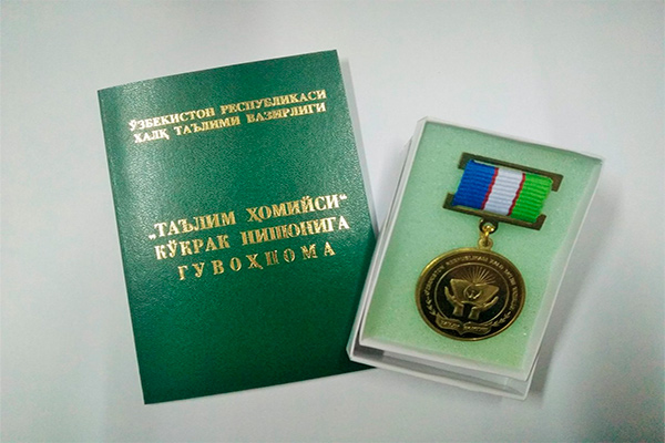 Head of the UNESCO Office in Uzbekistan awarded with badge of Talim Homiysi