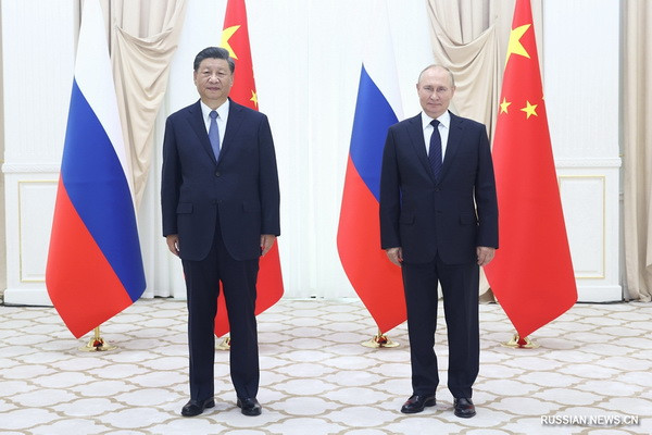 Си Цзиньпин провел встречу с В. Путиным