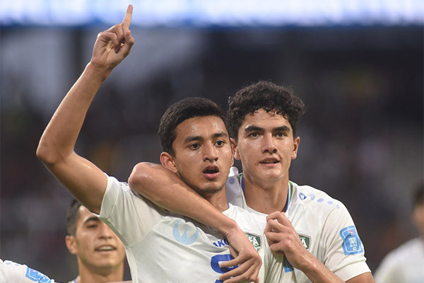 Nematjonov double sees Uzbekistan through to last 16