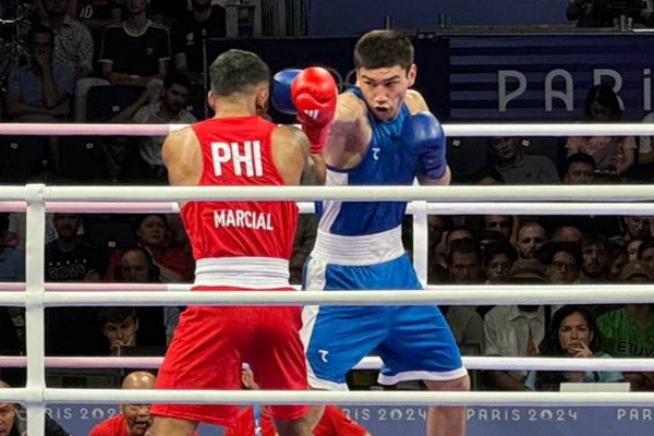 Turabek Khabibullaev defeats Olympic medalist