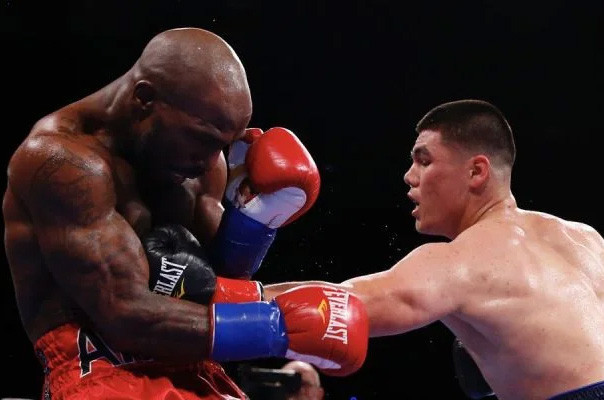 Bektemir Melikuziev clinches a technical victory over Pierre Dibombe