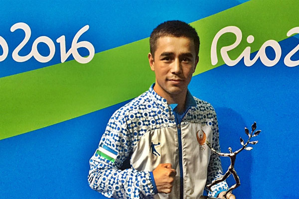 Hasanboy Dusmatov wins the Val Barker Trophy for the outstanding male boxer of Rio 2016
